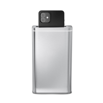 Simplehuman Cleanstation in Brushed Stainless Steel, UV-C sanitizer with phone inserted.